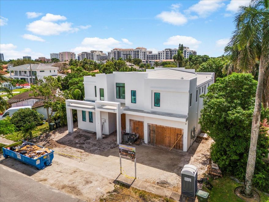 This exceptional, brand-new two-story estate by the renowned Yacov Development Group defines the pinnacle of modern luxury and architectural grandeur. Situated in the prestigious Boca Villas, this residence offers unparalleled resort-style living, beginning with a striking double-height foyer that leads into expansive living areas. Featuring six exquisite bedrooms, an elegant formal living room, a distinguished office, a state-of-the-art chef’s kitchen, & an inviting upstairs sitting area. An elevator provides easy access to all levels. The outdoor oasis features a lavish pool, covered patio, and a gazebo with a full outdoor summer kitchen and wet bar, perfect for grand entertaining. Ideally located in exclusive East Boca Raton. November 2025 Completion. Schedule a private tour today!