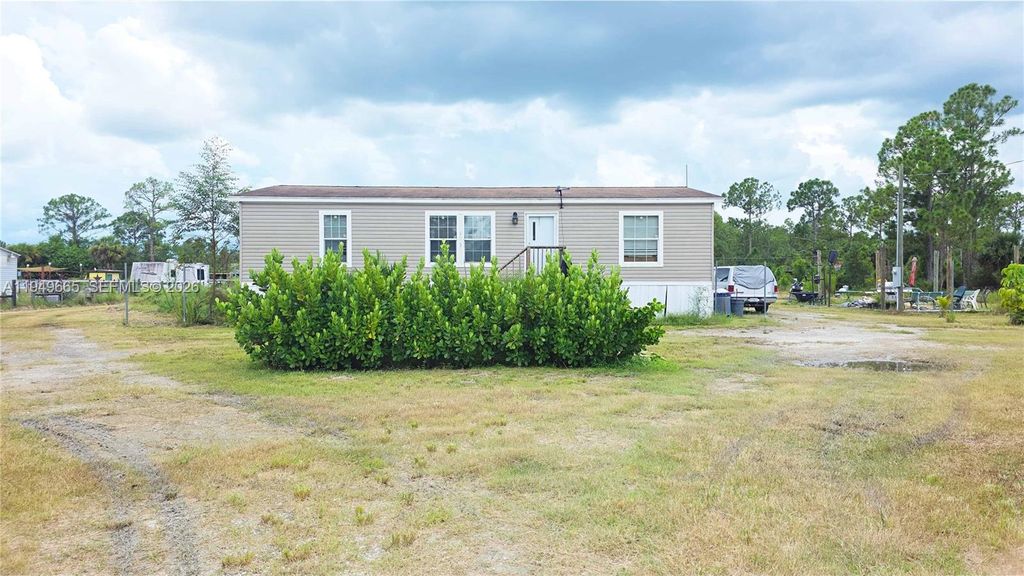 Photo of 612 Hunting Club, Clewiston, FL 33440 (MLS # A11949665)
