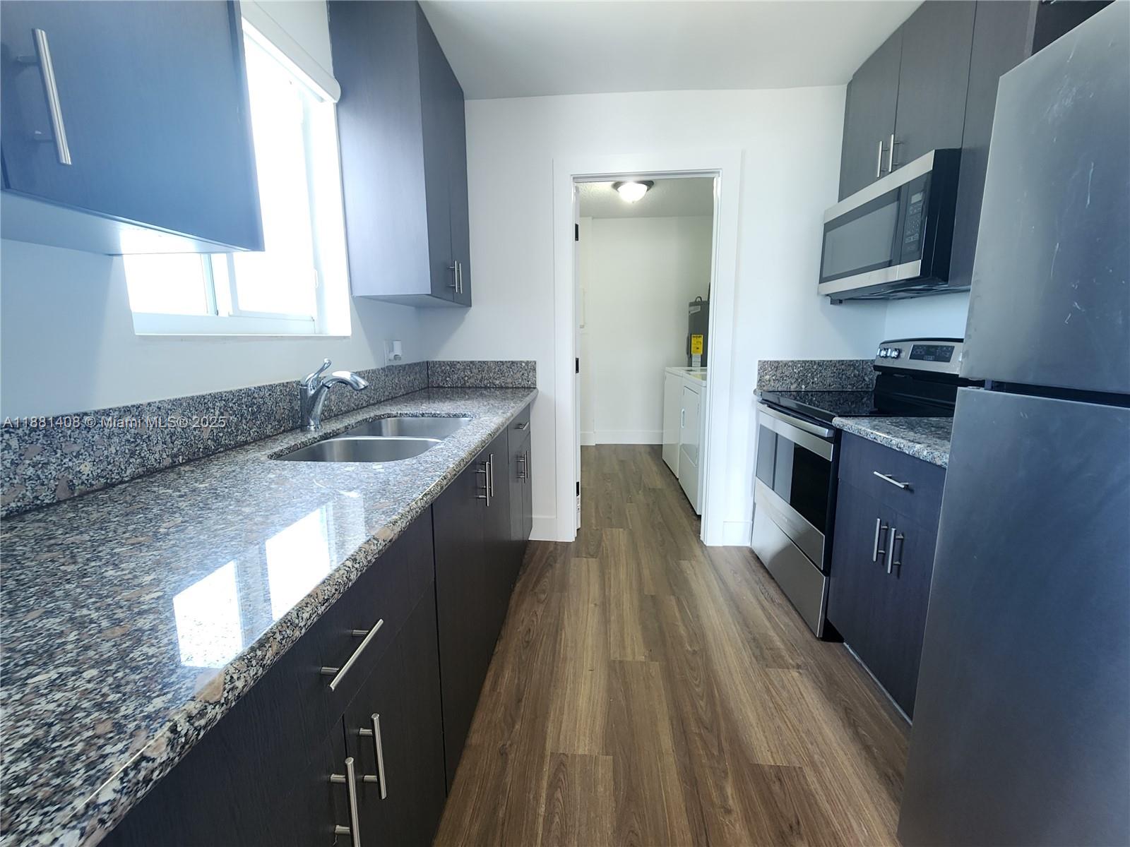 Enjoy modern lakefront living in this renovated 3BR/1BA duplex! Home offers impact windows/doors, luxury flooring, Italian porcelain bath w/glass shower, custom closets, and ample storage. Spacious kitchen with wood cabinets & stainless steel appliances, plus washer/dryer and central AC. Large fenced yard perfect for kids, friends, and BBQs. Plenty of parking and a serene water view, your ideal rental is here!
