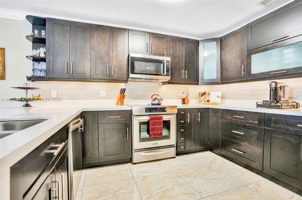 Photo of 9236 NW 54th St #9236, Sunrise, FL 33351 (MLS # A11833207)