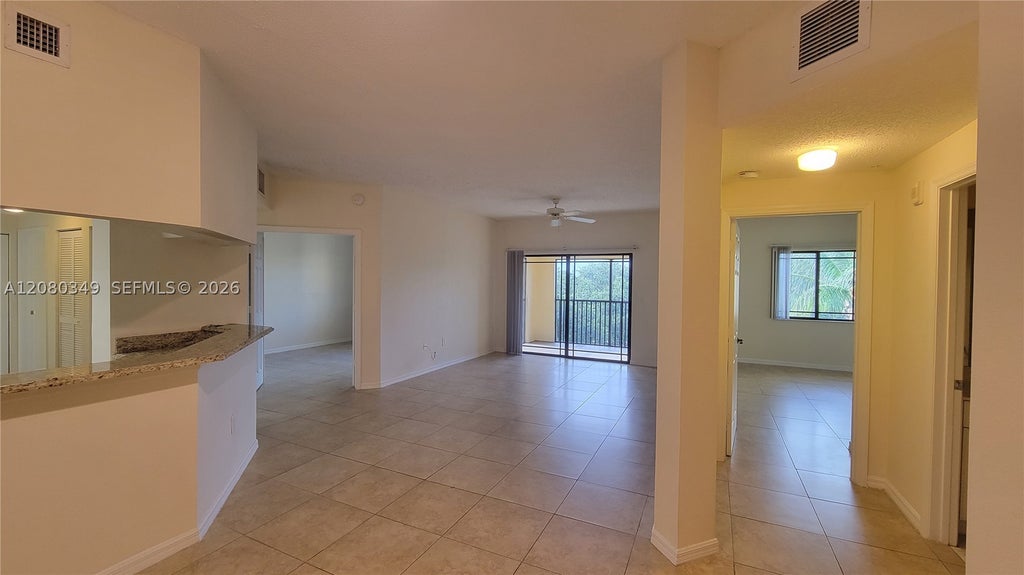Photo of 3018 Alcazar Pl #303, Palm Beach Gardens, FL 33410 (MLS # A12080349)