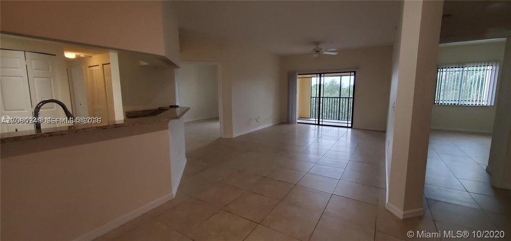 Photo of 3018 Alcazar Pl #303, Palm Beach Gardens, FL 33410 (MLS # A12080349)