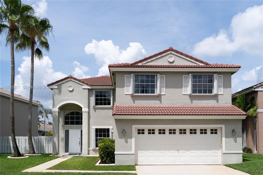 Welcome home to this beautiful 4-bedroom, 2.5-bathroom residence at Kesington Pembroke Pines. Step inside to find dramatic vaulted ceilings and elegant dark wood floors. The modern kitchen shines with white shaker cabinets, gold accents, and stainless steel appliances. You’ll love the updated bathrooms, dedicated laundry room, and spacious yard. This move-in-ready home offers the perfect blend of style and professional care. Renter's insurance is required. Contact us today to schedule your tour!