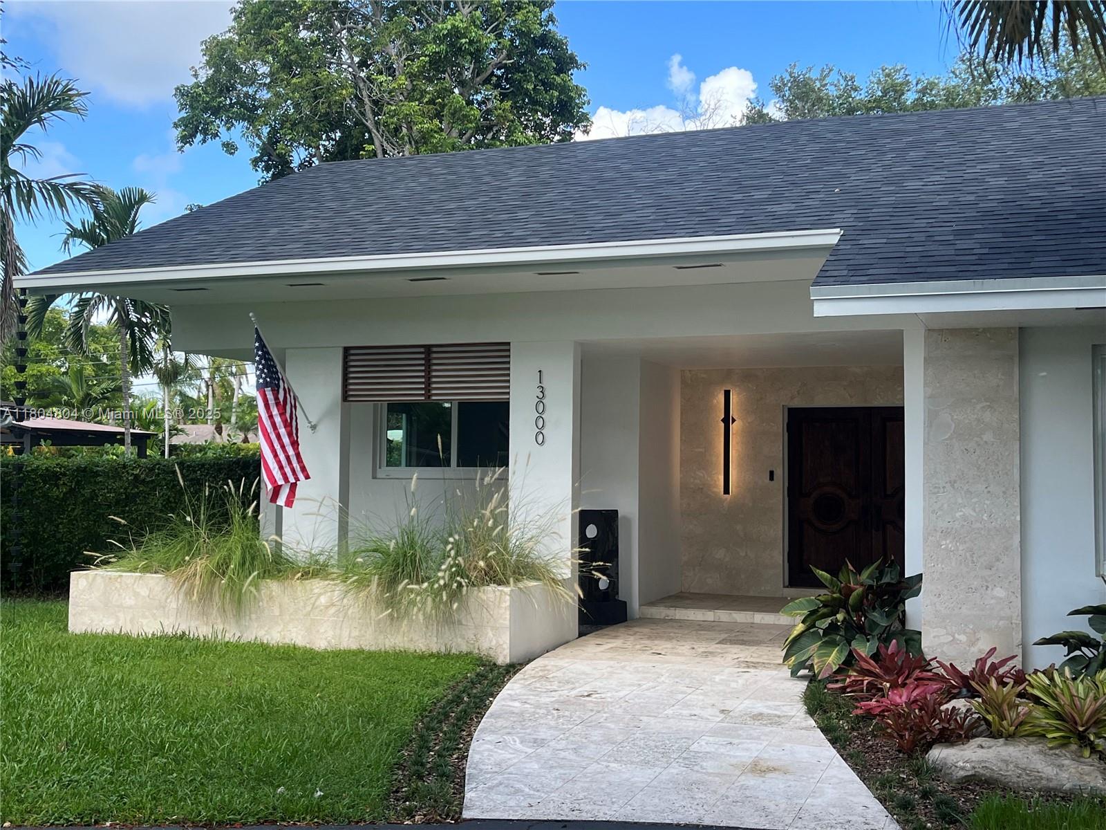 "Turnkey" completely remodeled Pinecrest home with 5 bedrooms, 4 full baths over 3000 SF living area in #1 LOCATION on coveted Palmetto Island. Super quiet street. Fully updated with top quality designer finishes. New roof, new plumbing, new porcelain floors, brand new kitchen appliances and cabinets, all new bathrooms; impact windows and doors; 2 car garage, plus circular driveway, indoor laundry room, huge pantry, beautiful pool area with BBQ kitchen, outdoor shower and well landscaped. Coral rock accents. The best updated house in Pinecrest for the price. Needs nothing ! Area under A/C 3075 SF; Adjusted area 3,536 SF per survey. Location, location, location.