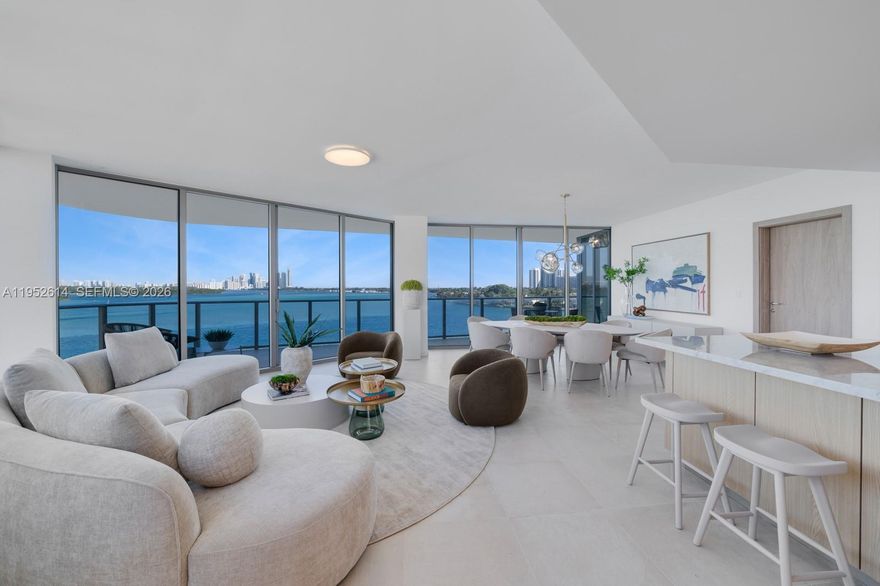 Step Inside With Me! Presenting a corner residence at Onda Residences—Bay Harbor Islands’ newest construction bayfront address. Never lived in, this light-filled home is surrounded by turquoise waters at every turn. Offering 3 en-suite bedrooms, a spacious den, and expansive terraces framing open bay views. Floor-to-ceiling impact glass, a private elevator foyer, Italian porcelain flooring, and custom doors set a polished tone throughout. The Snaidero kitchen is finished with marble counters and Miele appliances, while spa-like baths feature marble finishes and Italian cabinetry. Onda Residences' outstanding amenities include a grand pool, Technogym fitness center, wellness spa, and EV charging station — plus 2 parking spaces, storage, and 24-hour valet. Moments from Bal Harbour Shops, Four Seasons Surf Club, and the beach.