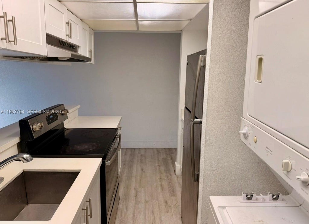 Photo of 4535 Treehouse Ln #F, Tamarac, FL 33319 (MLS # A11963794)