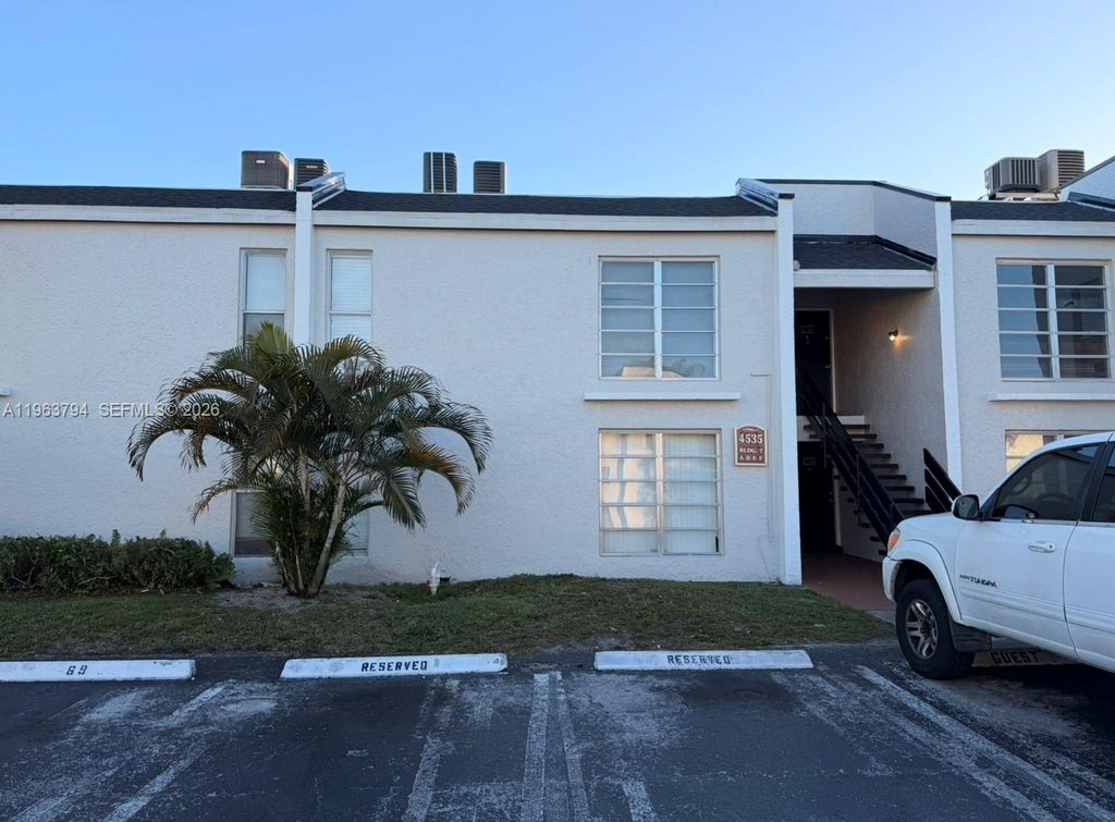 Photo of 4535 Treehouse Ln #F, Tamarac, FL 33319 (MLS # A11963794)