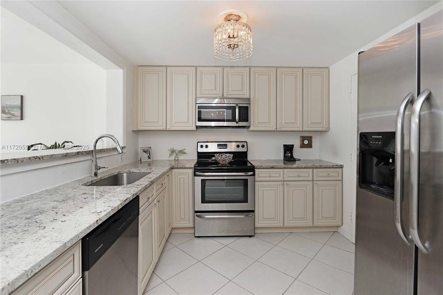 Bright and welcoming, this spacious unit in the 55+ community of Meadowbrook offers an open floor plan perfect for entertaining! Enjoy porcelain tile floors throughout, with vinyl flooring in the bedroom for a cozy added touch of comfort. The updated kitchen features wood cabinets, granite countertops, stainless steel appliances, and a pass-through to the living room. The modern bathroom boasts a granite vanity and walk-in shower with elegant porcelain tile. Floor-to-ceiling sliding doors open to a south-facing balcony, offering the ideal space to enjoy natural light while avoiding direct sun exposure. Additional key features of this home includes no popcorn ceilings, full impact windows and sliders, an oversized closet, convenient same-floor laundry facilities, and a private storage unit.
