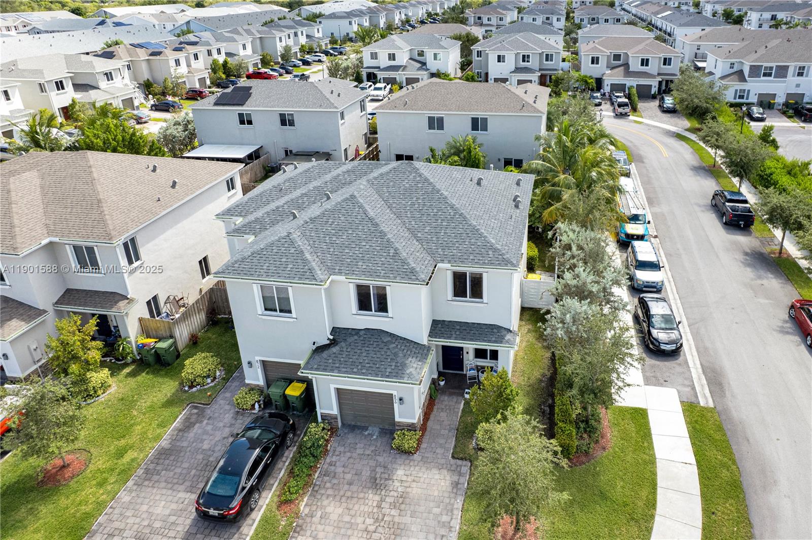Built in 2021, this modern 3-bedroom, 2-bath home offers open-concept living and a private tropical oasis in your own backyard. Featuring a bright kitchen with quartz countertops, stainless steel appliances, and an oversized island, this home is perfect for entertaining. Natural light fills the living areas, creating a warm and inviting atmosphere. The fully fenced yard is professionally landscaped with mature palms, a covered gazebo, and space to relax or host gatherings. Located in a sought-after community near top-rated schools, shopping, dining, and major highways, this move-in ready home delivers comfort, style, and the Florida lifestyle you’ve been waiting for.