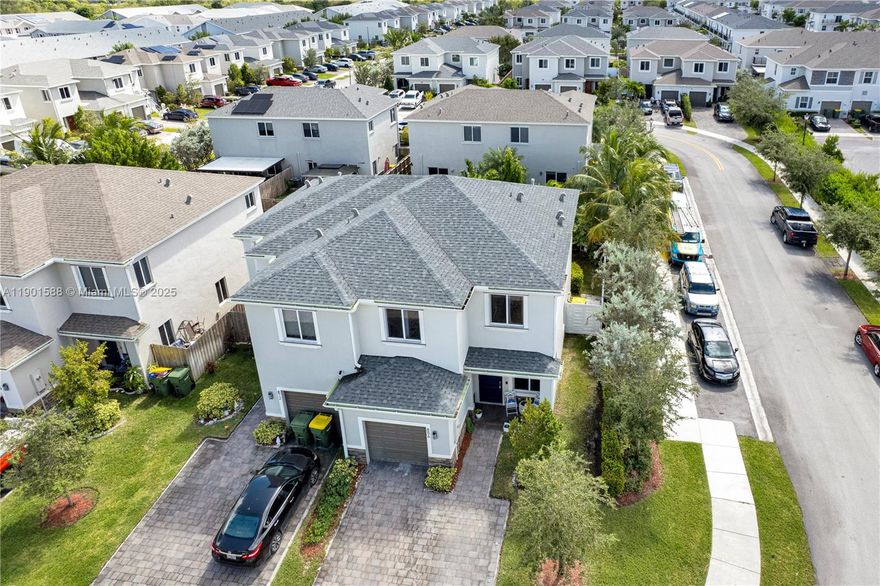 Built in 2021, this modern 3-bedroom, 2-bath home offers open-concept living and a private tropical oasis in your own backyard. Featuring a bright kitchen with quartz countertops, stainless steel appliances, and an oversized island, this home is perfect for entertaining. Natural light fills the living areas, creating a warm and inviting atmosphere. The fully fenced yard is professionally landscaped with mature palms, a covered gazebo, and space to relax or host gatherings. Located in a sought-after community near top-rated schools, shopping, dining, and major highways, this move-in ready home delivers comfort, style, and the Florida lifestyle you’ve been waiting for.