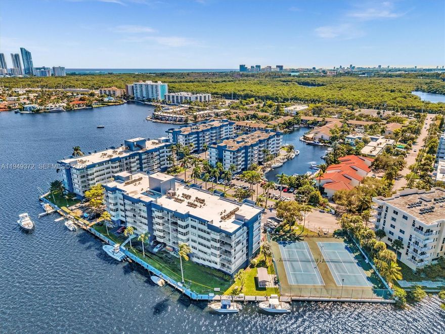 Location, location, location! Beautiful and great natural light through our this 1-bedroom, 1.5-bath condo featuring ceramic flooring, new impact windows and closets.  Building upgrades include a new lobby and new lounge.  Walking distance to Sunny Isles Beach, Oleta River State Park, restaurants, and movie theaters. Tranquil, secure, and move-in ready.
Building is in the final phase of its 40-year recertification, including new exterior paint. Enjoy resort-style amenities: two tennis courts, pool and deck, BBQ and picnic areas, gym with sauna and restrooms, gated security, dock access, car wash station, bicycle racks, and residents’ lounge with pool table, ping pong, 75” TV, plus free internet and cable.