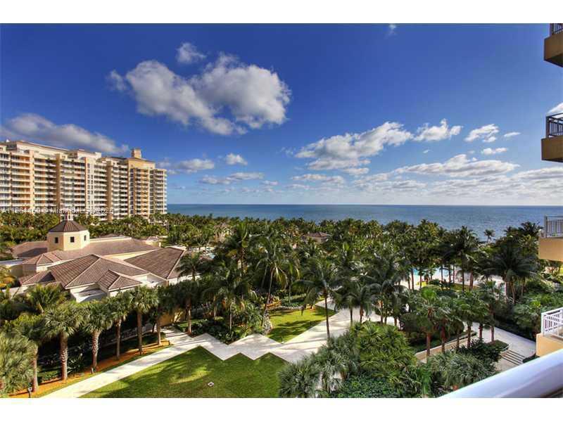 Experience the ultimate in oceanfront living! This spectacular flow-through 3 bed/3 bath condo offers sweeping ocean and bay views from every angle. Bright and spacious, it features professional design with Italian glass doors, European cabinetry, premium bath fixtures, and elegant marble floors throughout. Located in a world-class private members’ resort club, residents enjoy pools and beach service with attendants, a full-service spa, tennis, clubhouse, playground, and on-site restaurants. Luxury, comfort, and resort living—all in one.