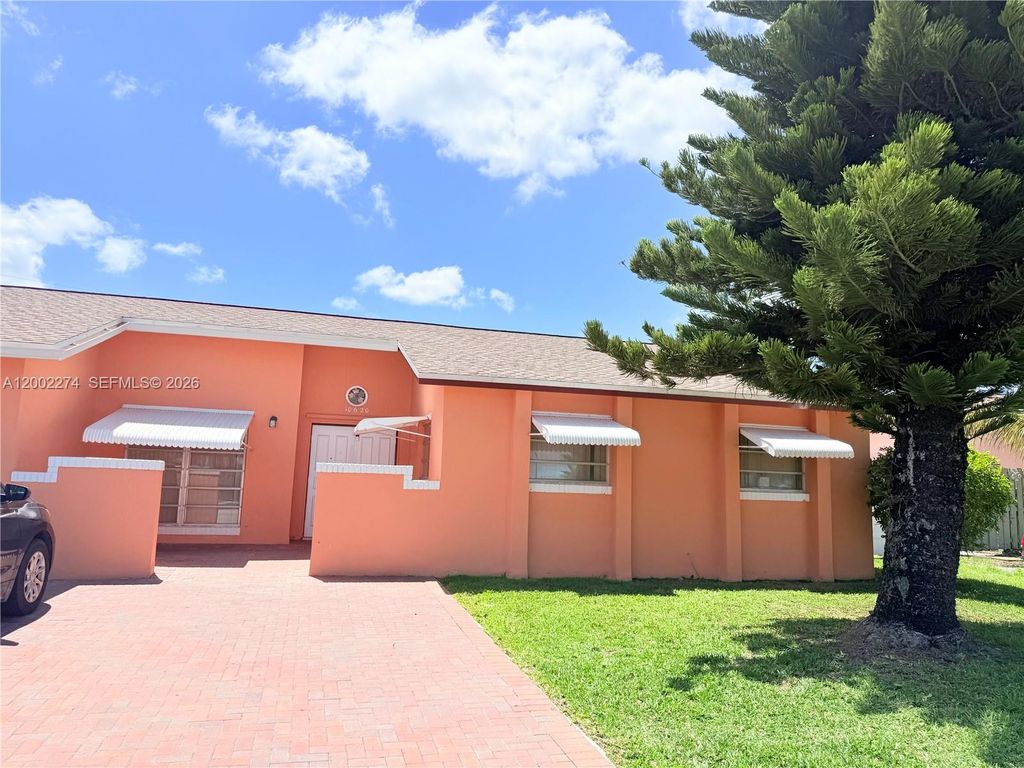 Photo of 10620 Sunset Strip #1, Sunrise, FL 33322 (MLS # A12002274)