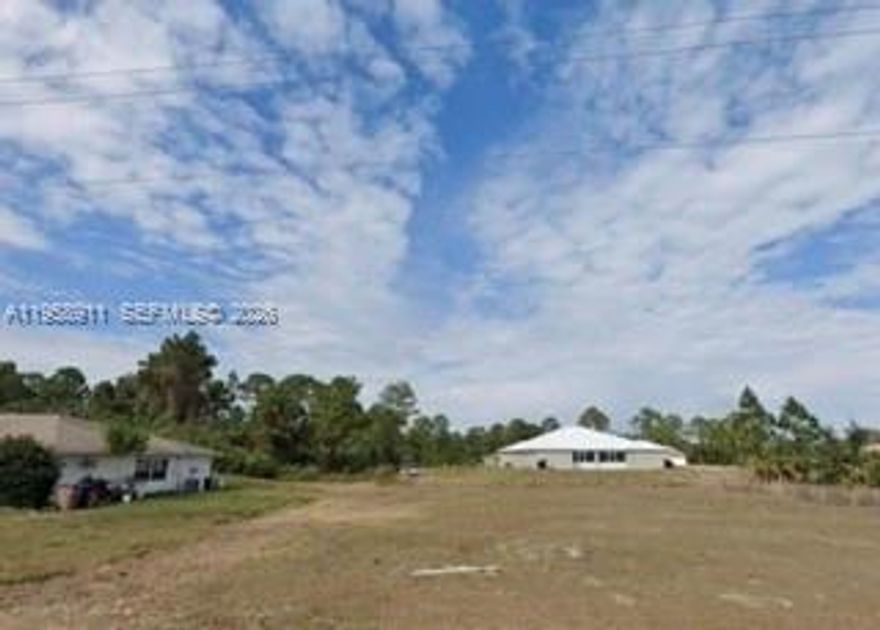 Prime vacant lot in a fast-developing area of Lehigh Acres, near Exit 82 and close to major roads. Approved duplex plans with 3 bedrooms and 2 bathrooms per unit. Impact fees pending. Ideal opportunity for investors or builders looking to start construction immediately.