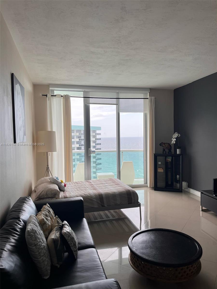 FOR RENT: Experience the ultimate in beachfront living with this stunning ocean-view penthouse. This beautifully updated one-bedroom, one-bath condo features a bright, open layout with modern finishes and breathtaking views of the water. Enjoy direct beach access, an upgraded kitchen, spacious living area, and a private balcony perfect for soaking in the coastal breeze. Ideal for anyone seeking comfort, style, and a prime waterfront location.