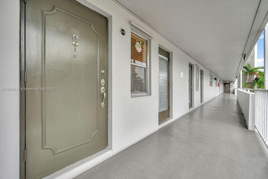 Photo of 4800 Hillcrest Ln #210, Hollywood, FL 33021 (MLS # A11889414)