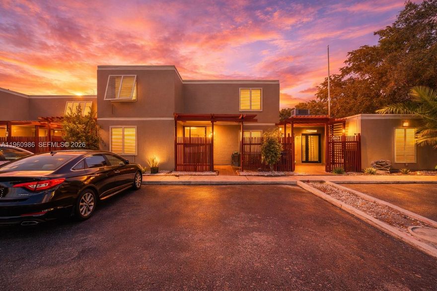 Lakefront 3BD/2BA fee-simple townhouse in Villas West with beautiful water views and direct lake access. Spacious 1,511 SF layout featuring first-floor entry, volume ceilings, ceramic + wood flooring, and an open modern staircase. Large sliding doors bring in natural light and lead to a covered/screened patio—perfect for relaxing or entertaining with serene lake views. Kitchen offers generous cabinetry and ample counter space; full-size washer/dryer in-unit. Community features include BBQ/picnic area and spa/hot tub, community pool, pickleball, clubhouse, plus security patrol. No renovations have been completed in the last 5 years. The roof was renovated approximately 8 years ago. Convenient Pembroke Pines location near shopping, dining, and major highways.