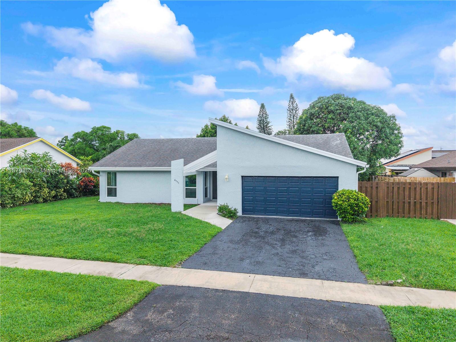 JUST BRING A TOOTHBRUSH!! NO HOA! Completely renovated home in one of Lauderhill’s most desirable areas! Featuring a 2017 roof, newer A/C & water heater, and full impact windows. This light-filled open floor plan boasts brand-new interior & exterior paint, fresh landscaping, recessed lighting, barn doors, and a modern, light design throughout. The kitchen and bathrooms have been fully updated with high-end finishes. Spacious two-car garage, new fixtures, and stylish details make this a true move-in ready home—you won’t need to lift a finger. Everything is NEW. Don’t miss this opportunity!