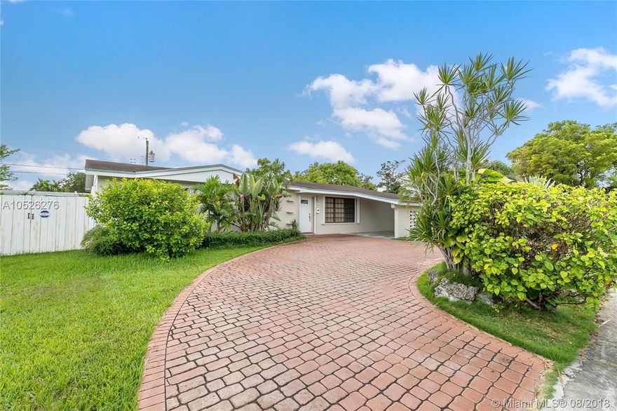 Charm, comfort, updates await the savvy buyer of this four bedroom home near Baptist Hospital, 874, 826, The Turnpike and all mayor shops and restaurants.  Property features porcelain floors  throughout, marble in the bathrooms, granite in the kitchen, a circular driveway, accordion shutters, etc., all this on an 8000 square foot lot in a great, safe neighborhood!