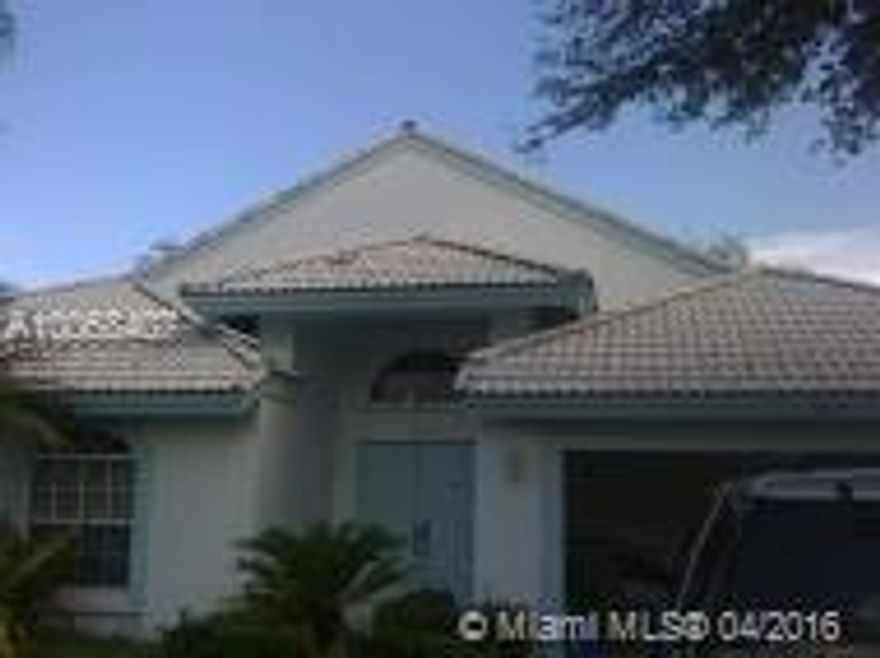 Everything you can imagine has been.  New barrel tile roof, plumbing, pool screen and more.  Don't miss this spacious 4 bedroom lake-front, pool home.  Excellent opportunity to own in a lovely gated community.