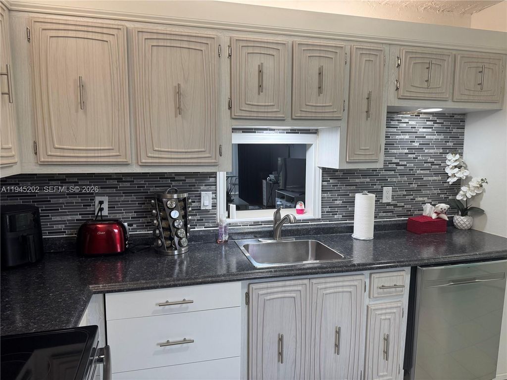 Photo of 2861 Somerset Dr #409, Lauderdale Lakes, FL 33311 (MLS # A11945202)