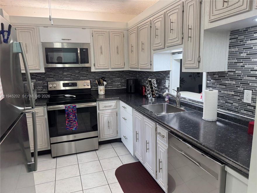 This 1010 sq.ft. renovated and turn-key furnished condo is located on the 4th floor. Bright living/dining area connects to the large balcony with garden view. You further find 2 large bedroom with walking closets, 2 renovated baths, lots of closet space, pantry & hurricane proof windows. This guarded 55+ community offers resort-style amenities - pool, fitness center, pickleball, tennis courts, shuffleboard, billiard, BBQ area.50-year inspection passed, roof replaced 2025 and reserves in place. No lease for 3 years.