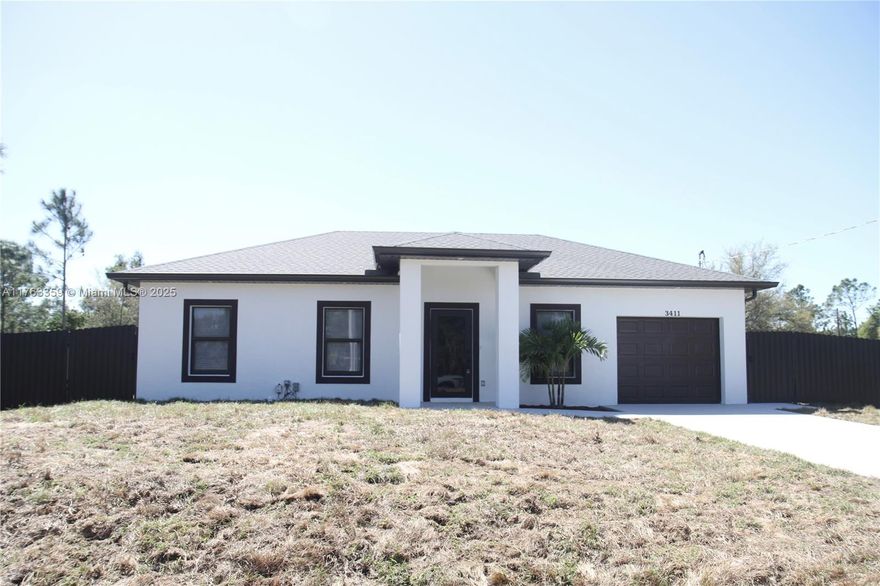 **SPLENDID NEW CONSTRUCTION!** This stunning property features 3 bedrooms and 3 full bathrooms. It showcases impact windows and elegant porcelain tile throughout the home. The open-concept kitchen boasts granite countertops, while the bathrooms are fitted with glass doors. Additional amenities include a laundry room and an abundance of natural light, perfect for enjoying Florida's sunshine. Don’t miss out on this peaceful property, conveniently located with easy access to Sunshine Boulevard and Buckingham in Fort Myers. Schedule your visit today! The seller is motivated and willing to assist the buyer WITH CLOSING COSTS.