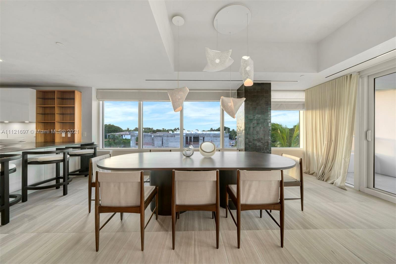 Redefine a luxurious lifestyle at The Ritz Carlton Residences, Miami Beach by Italian Architect Pierro Lissoni. Impeccably designed. A spacious 3 bed 3.5 bath, 3,140 SqFt per developer corner water facing residence with views from the jacuzzi on the covered terrace down the Surprise Lake waterway out to Biscayne Bay. Featuring, automated shades, an Italian custom made bar, 3 Frame smart tv’s, a sleep number bed, and full unit water filtration. Open concept kitchen by Boffi and Gaggenau including gas. In the primary bathroom a glass enclosed rain shower fitted with a jetted soaking tub. On site amenities will include the 1/2 Acre sized rooftop pool, art studio, theater, and children's playroom. Experience life at The Ritz-Carlton Residences!