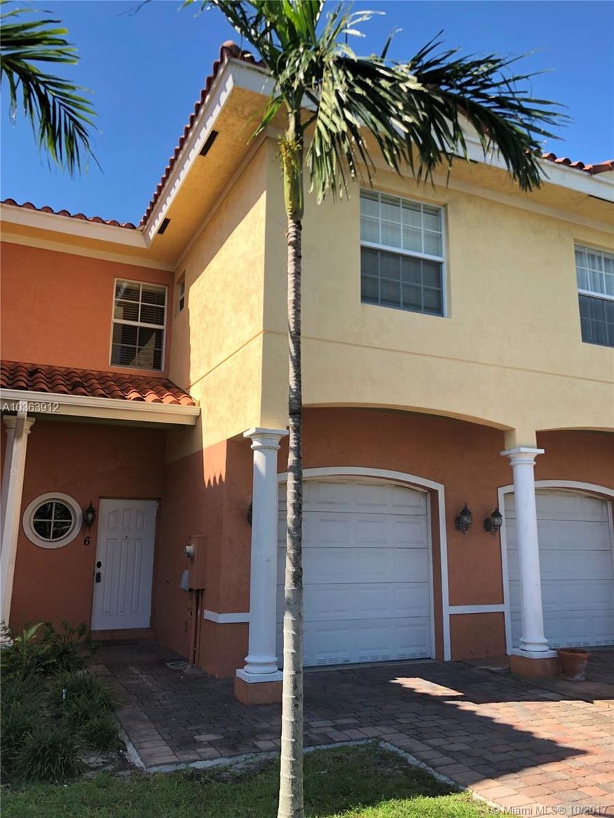 Beautiful 3bedroom/ 2.5Bath Townhome with Garage, Impact Glass, Tile and Laminate Floors, Granite Counter tops, Stainless Appliances