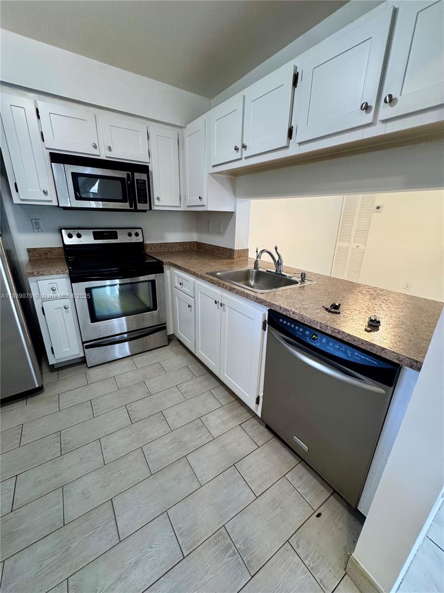 GARDENS NORTH FOUR CONDO - Residential Lease