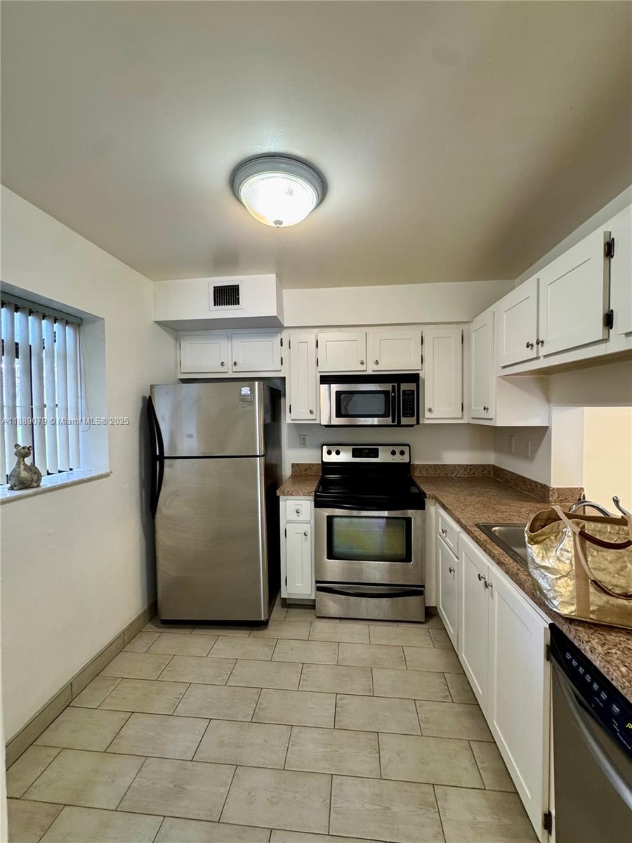 GARDENS NORTH FOUR CONDO - Residential Lease