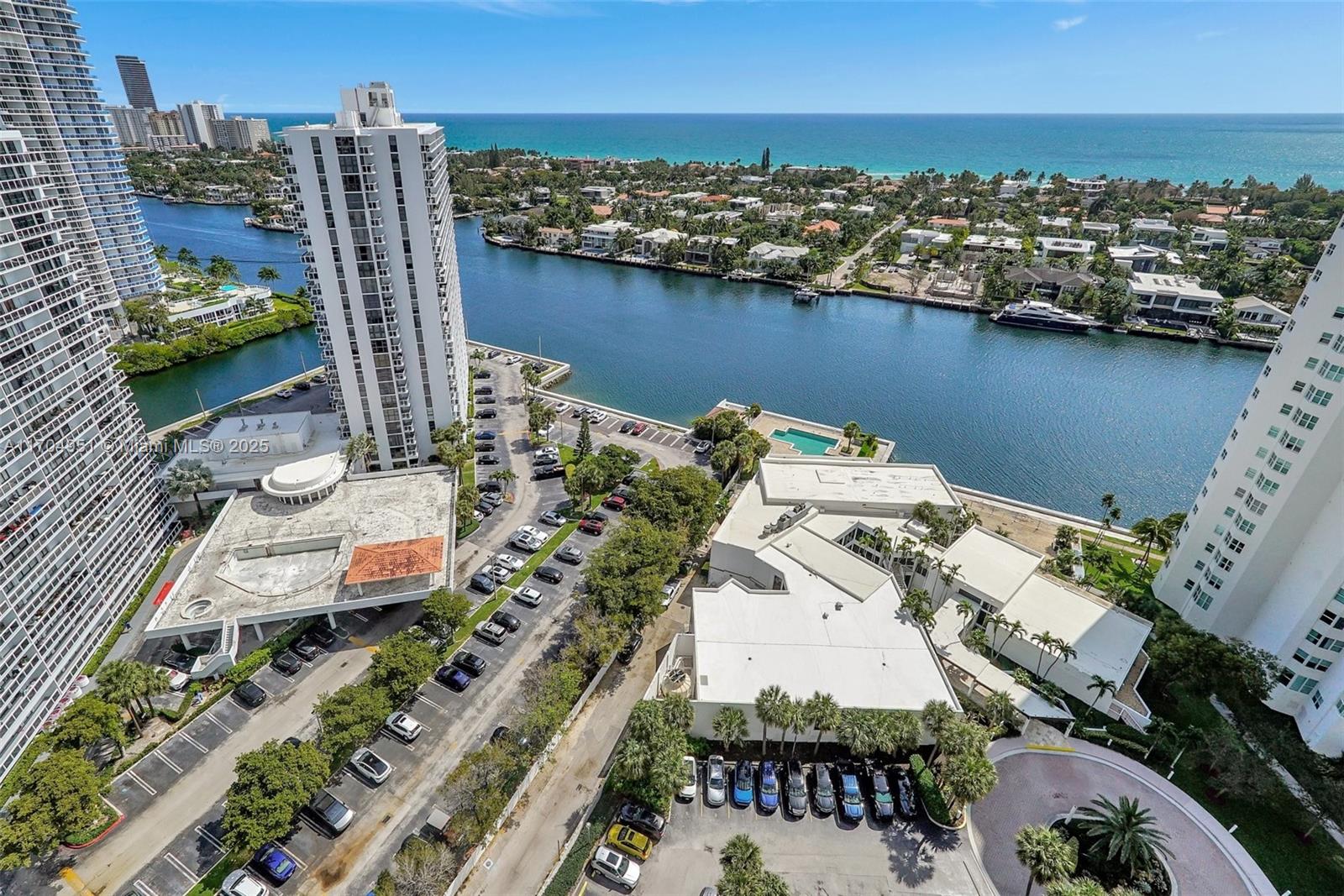WOW! The Best unobstructed intracoastal & ocean views over Golden Beach homes to take your breath away. The best views in coveted "04" line in Hamptons. Renovated kitchen & spacious floor plan with split bedrooms and a totally separate formal dining room or den or easily convert to third bedroom. Enjoy the water views from every room. Resort-style unsurpassed amenities: pools w huge deck & bbq, gym, media rm. library, event rm, enter club house to the second pool on the intercoastal,new gym,spa, sauna,nail spa, racquetball & tennis cts,kid rm, teen rm,card rm, & private Hamptons restaurant by the water. Enjoy your $100 a month dining voucher included in maintenance, room service, full movie theater, also cafe w outdoor seating & more! BOTH SPECIAL ASSESSMENTS HAVE BEEN PAID BY THE SELLER
