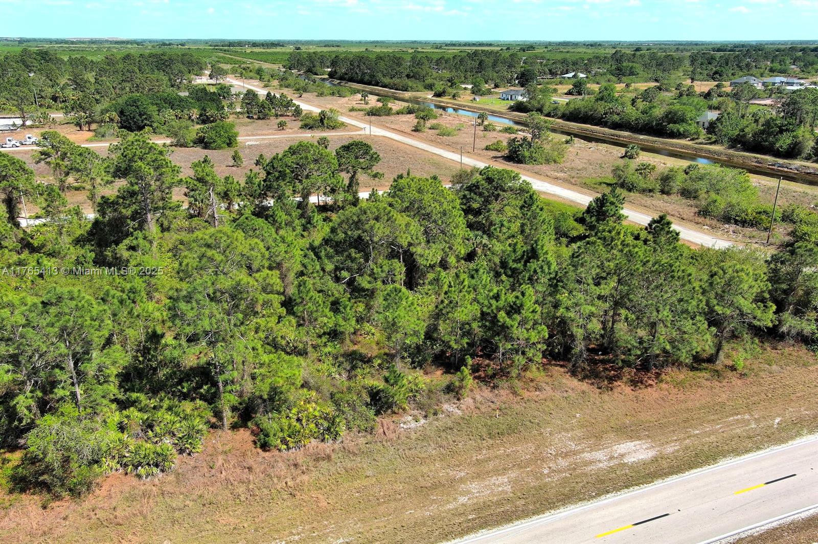 Exclusively presented by Sunland Real Estate: Prime half-acre residential lot in South East Lehigh Acres. Great location close to Hwy 82. This lot is ready for development. Sitting high and dry, safely outside any flood zone, this lot offers an excellent opportunity to build in one of Southwest Florida’s fastest-growing communities. Lehigh Acres is known for its affordable land, friendly neighborhoods, and convenient access to Fort Myers. Just a short drive from shopping, dining, and the breathtaking Gulf Coast beaches, this property offers an excellent opportunity to develop your next project in a thriving and fast-growing community.