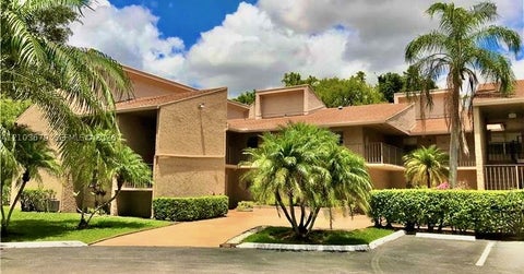 Photo of 7502 NW 86th Ter #202, Tamarac, FL 33321 (MLS # A12103679)