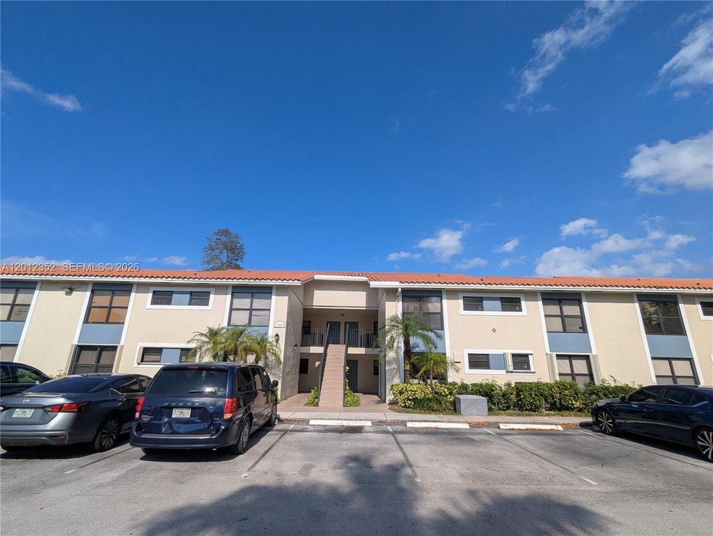 Photo of 1564 Lake Crystal Dr #F, West Palm Beach, FL 33411 (MLS # A12012352)