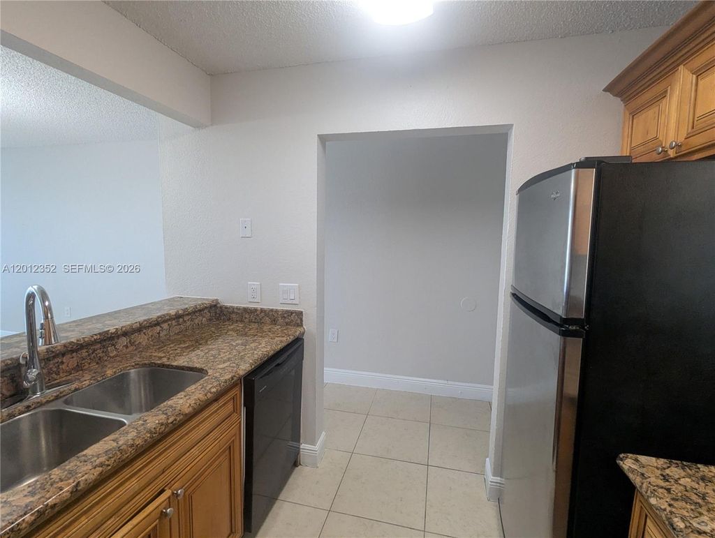 Photo of 1564 Lake Crystal Dr #F, West Palm Beach, FL 33411 (MLS # A12012352)