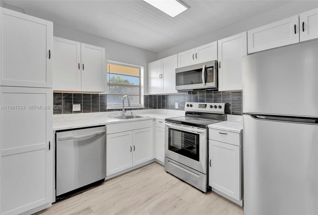 Photo of 2060 NW 81st Ave #322, Pembroke Pines, FL 33024 (MLS # A11981233)