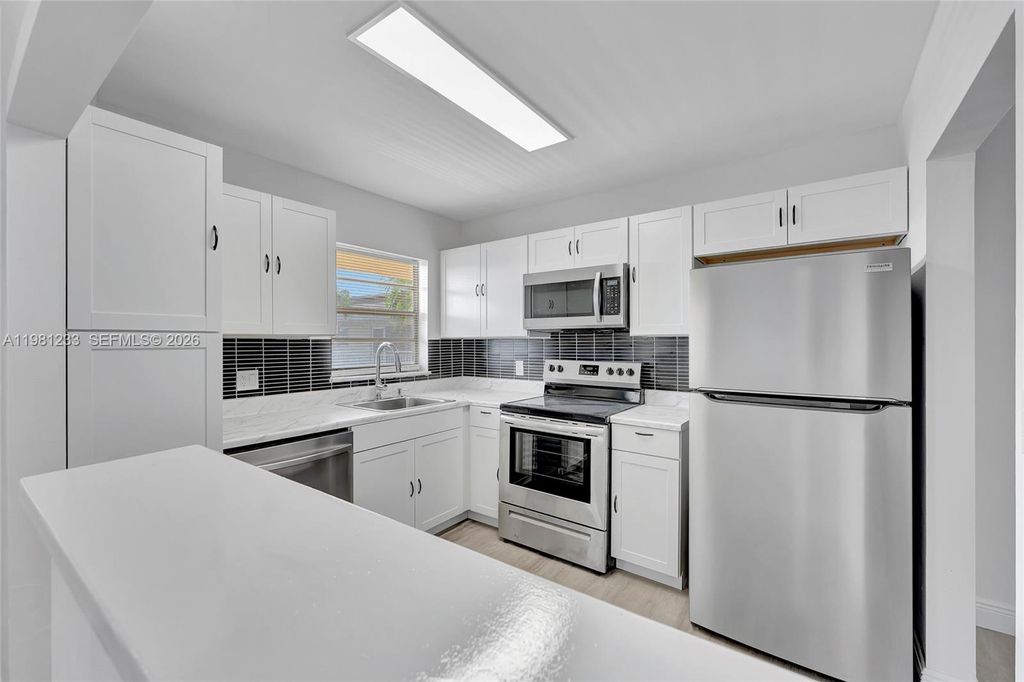 Photo of 2060 NW 81st Ave #322, Pembroke Pines, FL 33024 (MLS # A11981233)