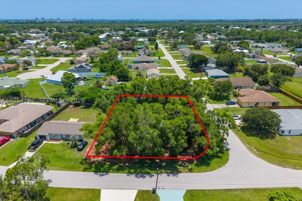 Photo of 2801 SE Leigh Ave, Port St Lucie, FL 34952 (MLS # A12054587)