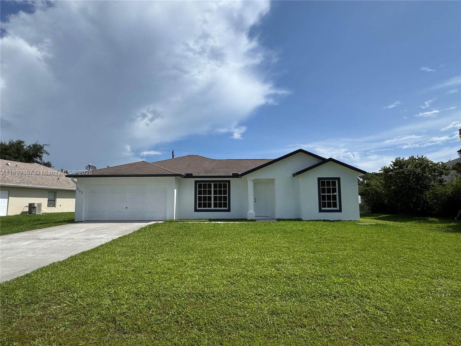Beautifully updated 3-bedroom, 2-bath home located in the desirable neighborhood of Sandpiper Bay in Port St. Lucie. This move-in ready property features fresh interior and exterior paint, wood-look vinyl flooring throughout, and a bright white kitchen with modern finishes. Both bathrooms are tastefully finished with stylish fixtures and tile work. Enjoy spacious living areas, natural light, and a split-bedroom layout for added privacy. Located just minutes from parks, shopping, dining, golf courses, and the scenic St. Lucie River. No HOA and close to major highways for an easy commute. Don’t miss this charming home in a quiet, well-kept community!