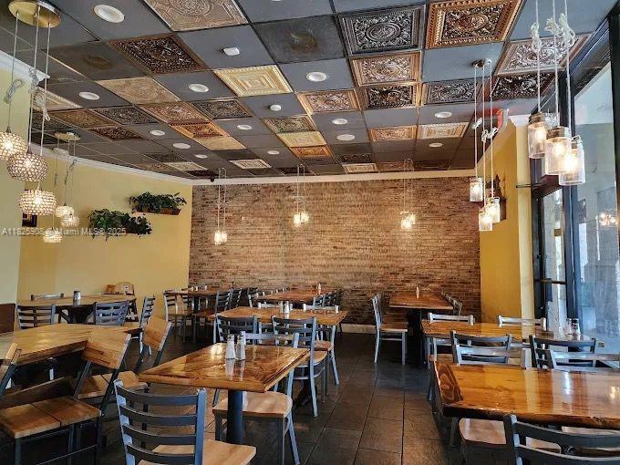 An absolute gem in the heart of Jupiter! Bring your Italian culinary vision to life in this prime, high-traffic location. This asset sale includes a high-quality, fully equipped, and recently updated commercial kitchen, with over $500,000 in restaurant build-out improvements. The offering features a long-term 20-year lease at nearly 50% below current market rates, presenting exceptional value. Transferable beer and wine license with the option to qualify for 4COP. This turnkey opportunity is perfectly positioned next to Cinepolis Luxury Cinema and across Maltz Jupiter Theatre, attracting a steady flow of patrons seeking a welcoming spot to dine and unwind.