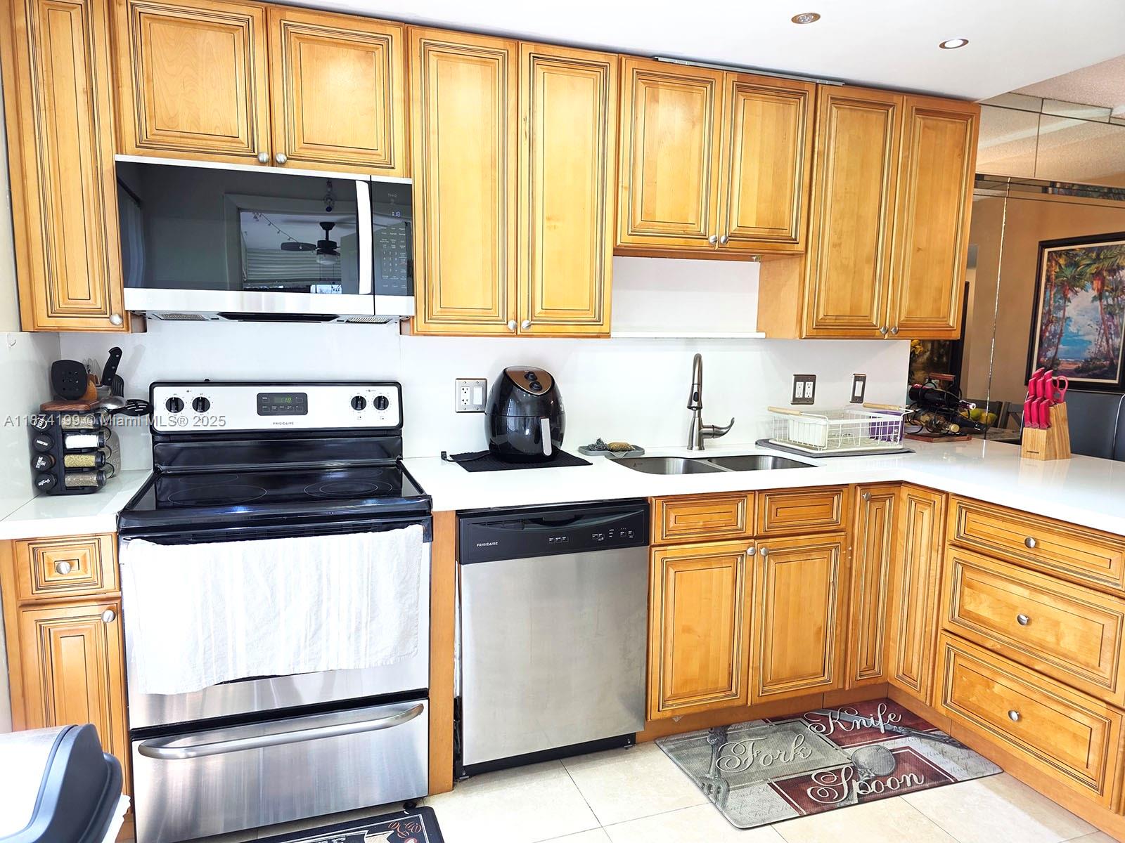 Amazing first-floor corner unit at The Manors of Inverrary! This all-ages, gated community offers 24/7 security. The bright unit features an updated kitchen with quartz countertops, stainless steel appliances, and new refrigerator. Enjoy the convenience of in-unit washer/dryer, new AC (2022), tile flooring throughout, and wood laminate in the bedrooms. The spacious master suite includes a walk-in closet and private bath. Relax on the screened porch overlooking breathtaking golf course views.
Community amenities include pool, tennis, basketball, fitness center, clubhouse, and more. Conveniently located near parks, schools, shopping, and major highways. Move-in ready!
Monthly maintenance covers hot water, basic cable, common areas, exterior maintenance, insurance, trash, and sewer.