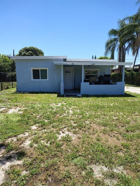 Photo of 311 NW 28th Way, Fort Lauderdale, FL 33311 (MLS # A12016091)