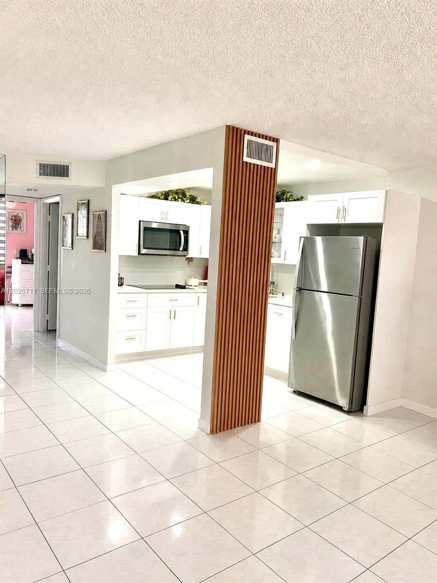 Photo of 9081 Sunrise Lakes Blvd #113, Sunrise, FL 33322 (MLS # A12025711)