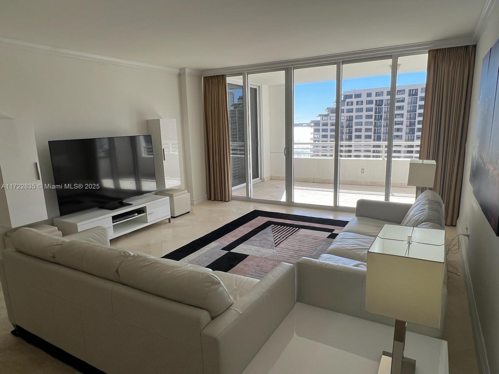 Pristine, fully and tastefully furnished, fitted and equipped 2 bedroom, 2.5 bathroom unit in luxury Tequesta Three tower of exclusive Tequesta Point gated community on Brickell Key - only your clothes needed. 1,734 sq ft, sunlit south-facing, split floor plan unit with living room, master bedroom, and kitchen opening onto spacious 220 sq ft covered terrace, with views of Biscayne Bay, Brickell Key and Brickell. Only two units share the elevator lobby serving the unit and all common areas of the building are immaculate and quiet. Unit has a well situated dedicated parking space, secure storage and 24 hour access to in-building Amazon Locker. Residents have access to Tequesta Point’s world-class amenities, including pool, fitness center, tennis courts, and 24-hour concierge and security.