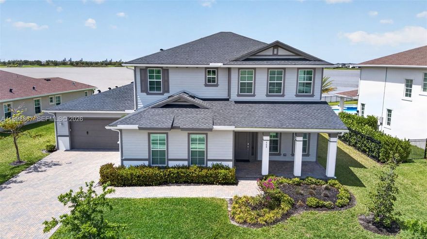 Welcome to the Award Winning Master Planned Gated Arden Community & this stunning Direct Lakefront Newly Built Residence at 769 Hookline Circle on Millionaire’s row. Compare to 679 Hookline similar size, just closed $1,340,000. Just add your pool and deck in this huge backyard and you have plenty of equity. 6 bedrooms + Loft, 4.5 baths, all impact windows & doors, fine finishes. 1st Floor has the primary Suite w/dual walk in closets & huge bath, Great room, dining, breakfast area,  oversized gourmet quartz island kitchen, office (could be 6th bedroom if a door & closet is added), great for multi-generational living, or a buyer who needs a 2nd room downstairs), laundry, 3 car garage. Your upstairs has a loft area, 2 more junior en-suite bedrooms and 2 jack & Jill style bedrooms. Enjoy fishing right from your backyard. Probably the nicest amenities anywhere: 1200 acres include miles of trails & lakes for kayaking & fishing, 2 clubhouses, resort style pools, state of the art fitness center, Skate & dog park, tennis, pickleball, basketball, boat ramp, fishing piers, skate park, and a 5 acre working farm with organic produce, eggs, honey, meat & endless social events. Just come by on Friday evenings and Saturdays and see an amazing sense of community that you won’t find anywhere else. Zoned for the top rated Wellington K-12 Schools plus walking distance to the new Saddle View Elementary School now open. 3 miles to Palm Beach state College Campus. The backyard pool photos are virtual renderings.   Conventional,FHA,VA financing is okay, large dogs okay, renting okay.