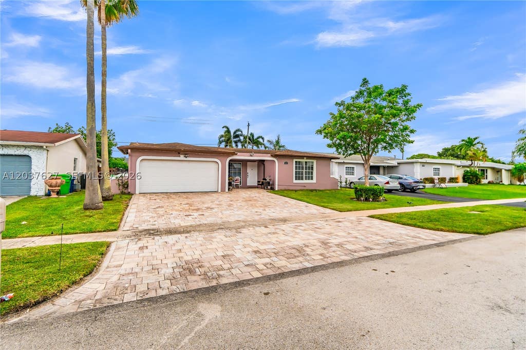 Photo of 2751 NW 107th Ter, Sunrise, FL 33322 (MLS # A12037627)