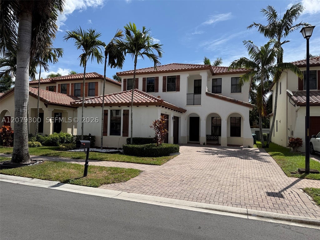 Photo of 2673 NW 83rd Ter #2673, Cooper City, FL 33024 (MLS # A12079300)