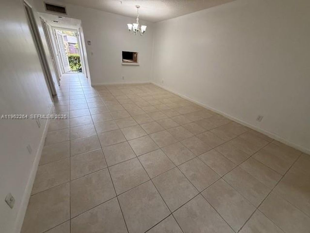 Photo of 301 Cambridge Rd #106, Hollywood, FL 33024 (MLS # A11962264)
