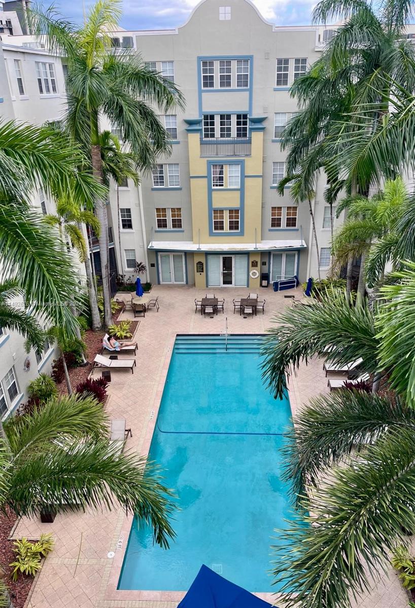 Best line of the building! TOP FLOOR 2 beds 2 baths, split plan with big walk in closets, full size washer and dryer, stainless steel appliances, wood floor trough out, huge balcony overlooking the pool, spa and bbq area. Internet, basic cable and water included. Building is very well maintained. It offers a huge heated pool, spa/hot tub, bbq area, fully equipped state of the art gym, pool table, and a nice rooftop with lounge chairs, shower, another bbq and amazing views of the city. Walking distance to Downtown, coffee shops, local beer gardens, restaurants, the Fat Village Art Walk. 1 pet per unit up to 50lbs. $500 Non refundable pet fee to assoc + $250 to landlord. 620 Min credit score per the association.